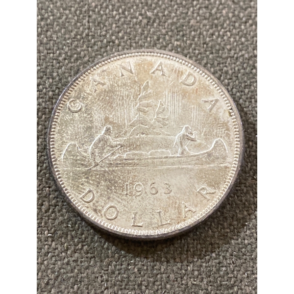 1963 Canadian Silver Dollar Featuring Voyageur Design
