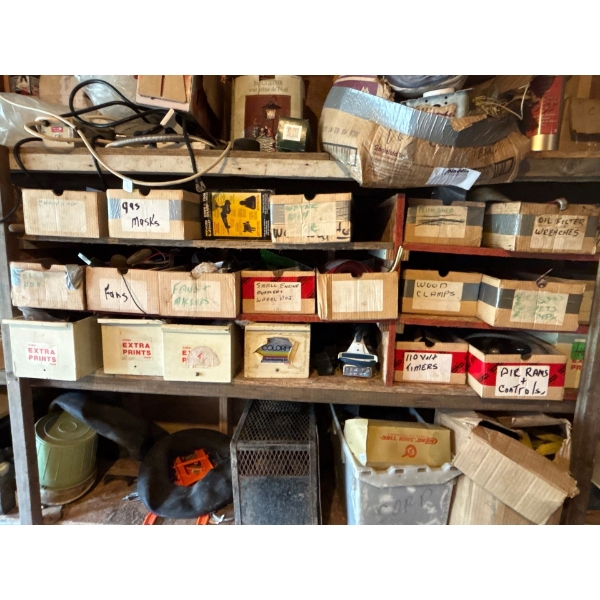 Tons of miscellaneous clamps, oil filter, wrenches, small engine, mufflers, masks, air, Rams, and co