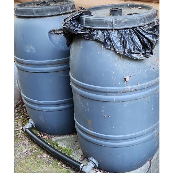 Two Rain barrels and Hose as Shown (1st)
