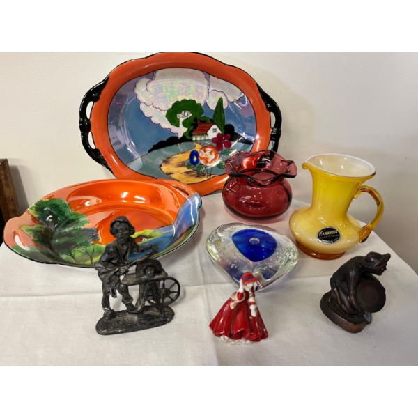 Variety of decadent collections, including half crafted glassware, vintage heart shaped Fenton glass