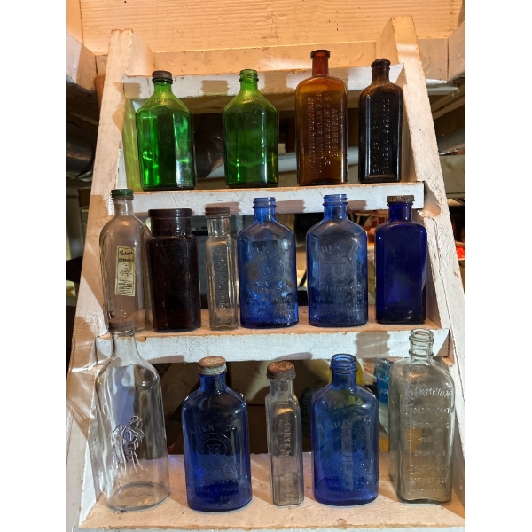 amazing selection of green Amber, blue large and medium apothecary embossed medicine bottles high va