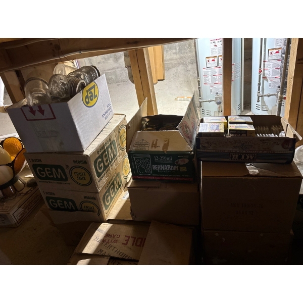 Canners dream huge amount of canning supplies, small jars, medium size jars, large jars, a number of