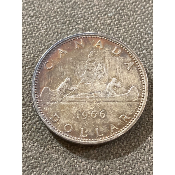 1966 Canada Silver Dollar Coin Featuring Canoe Design