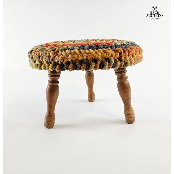  Vintage Footstool Featuring A Colorful, Woven Rug-Style Top With Textured Pile And Three  Wood Legs