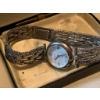 Image 3 : Silver Watch With Case and Green Clutch Purse