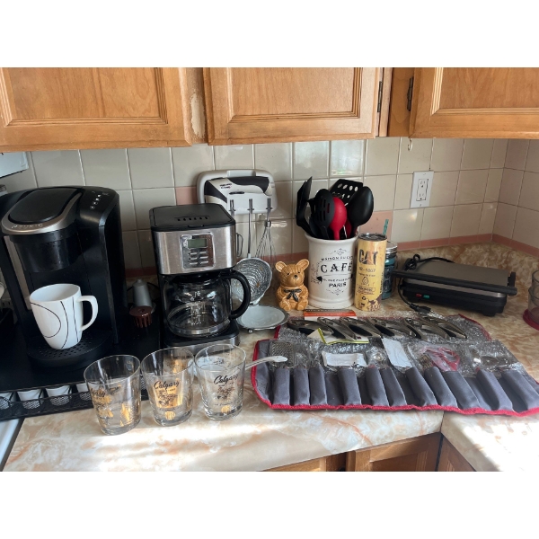 Several Kitchen Items. Vintage Pyrex Measuring Bowls, Utensils, Keurig and Coffee Maker, Sandwich Pr