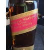 Image 2 : Johnnie Walker Red 3.79 Litre with a Bottle Cradle
