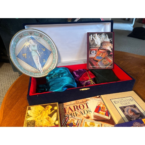 Collection of tarot cards, tarot card, books, palm, reading books, all in a velvet case