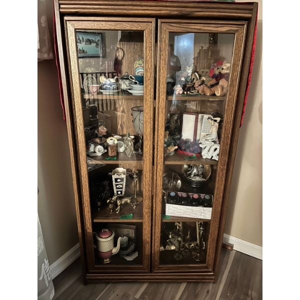 antique China cabinet with three shelves, nice solid wood design with glass front doors
H54 L29 W12