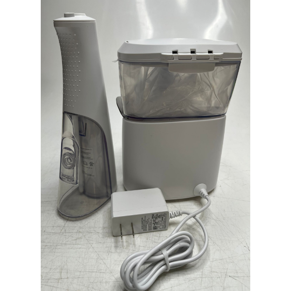 WATERPIK ULTRA PLUS & CORDLESS ENHANCE WATER FLOSSER COMBO PACK (SLIGHTLY USED)