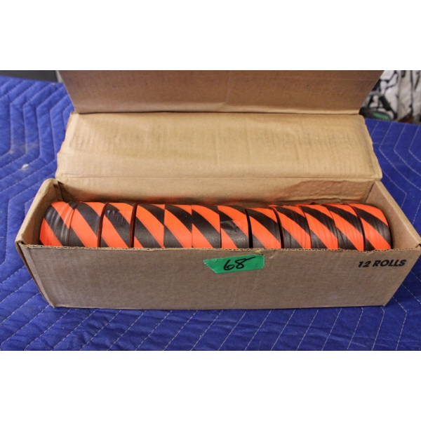 12 Rolls of Black and Orange Striped Tape

