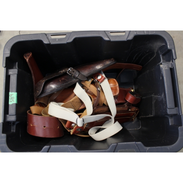 Box of leather belts and holsters