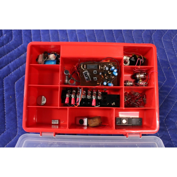 Red Plastic Organizer With Electronics and Components
