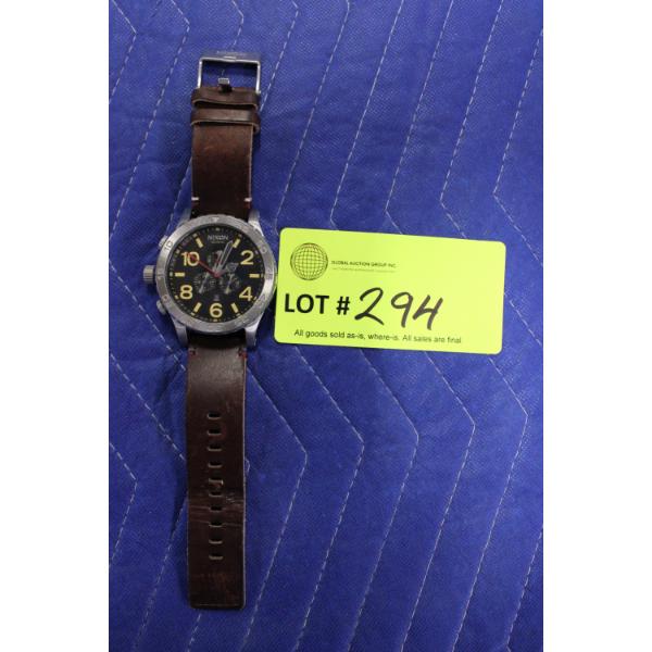 Nixon Chronograph Watch with Leather Strap
Nixon chronograph wristwatch featuring a stainless steel 