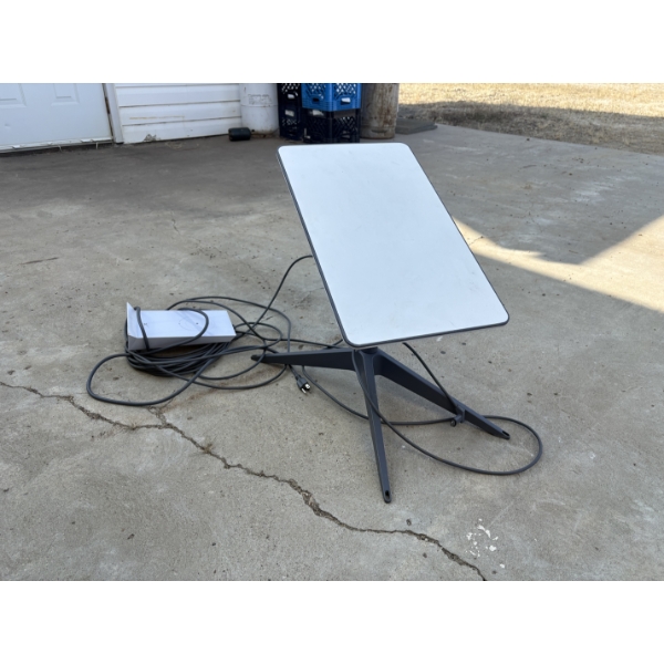 Starlink Satellite Internet Receiver, includes antenna and receiver module. 