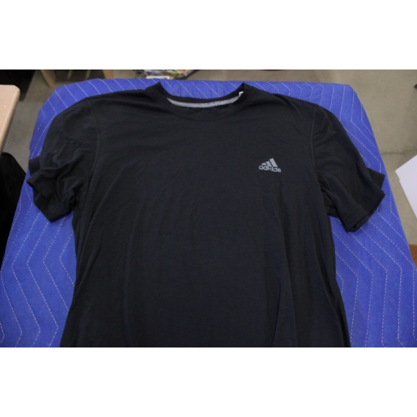 T-Shirts Featuring Various Bands, Brands, and Designs
