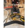 Image 4 : Yardworks electric snow thrower with attached yellow extension cord. Includes instruction manual and