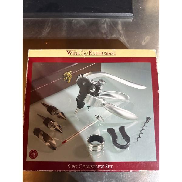 Nine piece wine enthusiast corkscrew set.