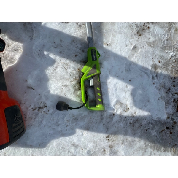 Greenworks Pro 60V brushless string trimmer, similar to the GD60BCB model. 
Technology: Features a b