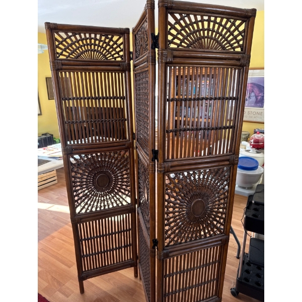 This vintage 3-panel room divider features intricate Italian rattan and wicker styling with a distin