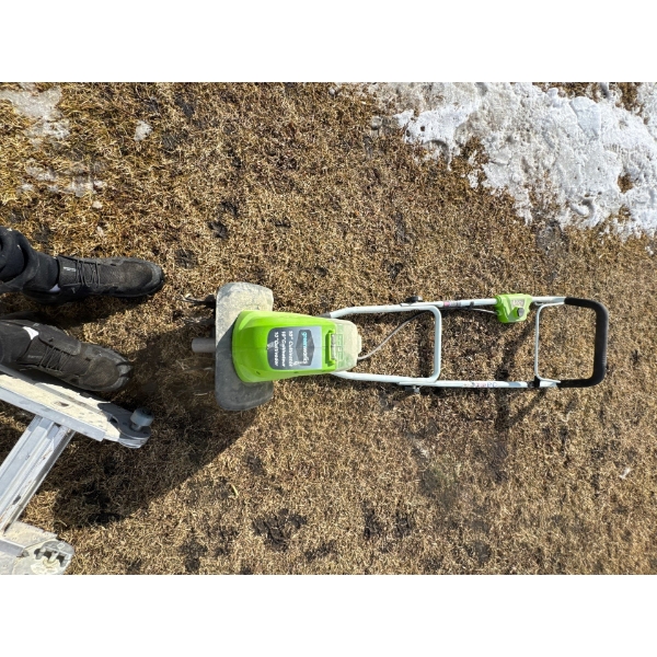  Greenworks garden cultivator or tiller, likely a 40V model such as the 27062A, used for breaking up