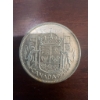 Image 1 : 1958 Canadian 50 cents coin featuring the young portrait of Queen Elizabeth II and the Canadian coat