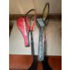 Image 1 : Two vintage rackets with their respective covers, one Dunlop squash rackets, specifically including 