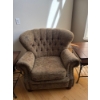 Image 1 : #2 traditional-style armchair featuring a tufted wingback design, rolled arms, and decorative nailhe