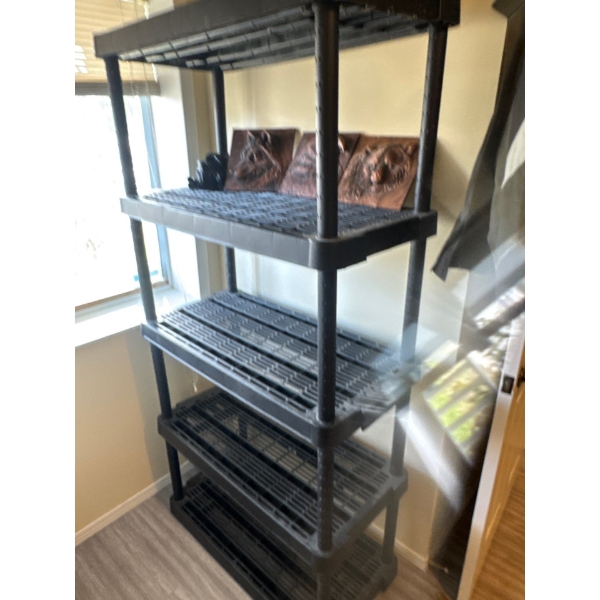 Plastic shelving unit 37in wide 72in tall and 18in deep