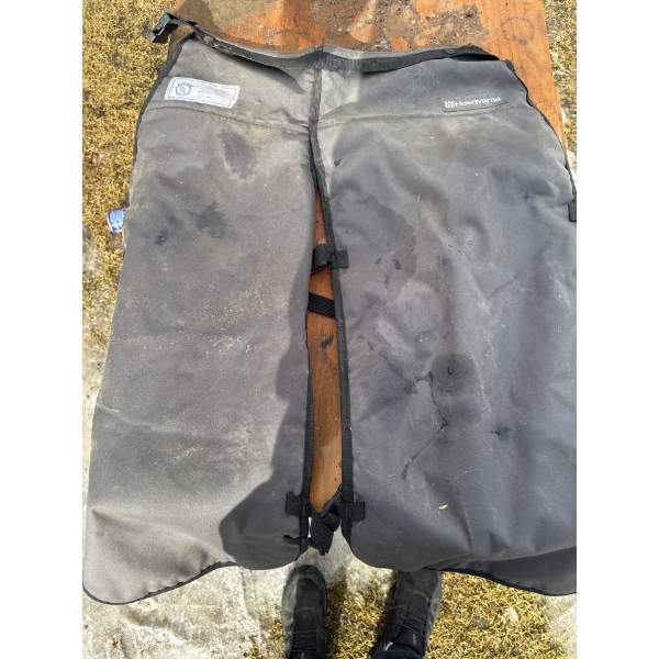 Husqvarna functional apron chainsaw chaps designed to reduce injury risk. 
