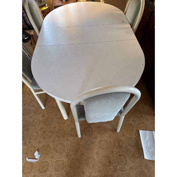 Six foot kitchen table and four matching chairs.