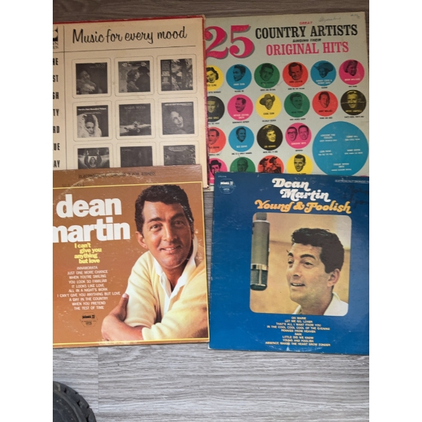 Four vinyl LP records including three Dean Martin albums and '25 Country Artists Original Hits.' Alb