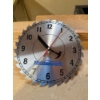 Image 1 :  Mastercraft saw blade shop clock is a themed wall clock featuring a circular steel saw blade dial, 