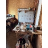 Image 7 : Back corner of shop, all contents included, including hijack, bench.