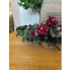 Image 3 :  various artificial plants and floral arrangements in baskets, which are commonly used for seasonal 