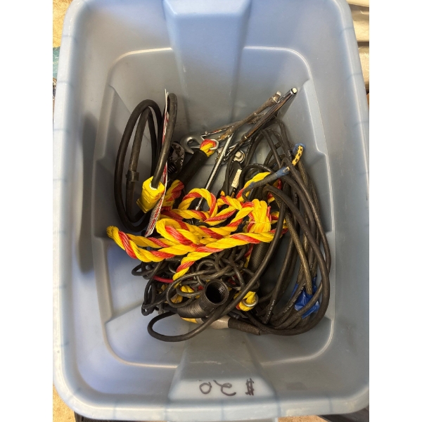  storage container filled with various industrial and construction tools,