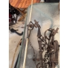 Image 3 : One metal blow torch with a wooden handle, one ribbed metal oil or fuel can, and a group of metal an