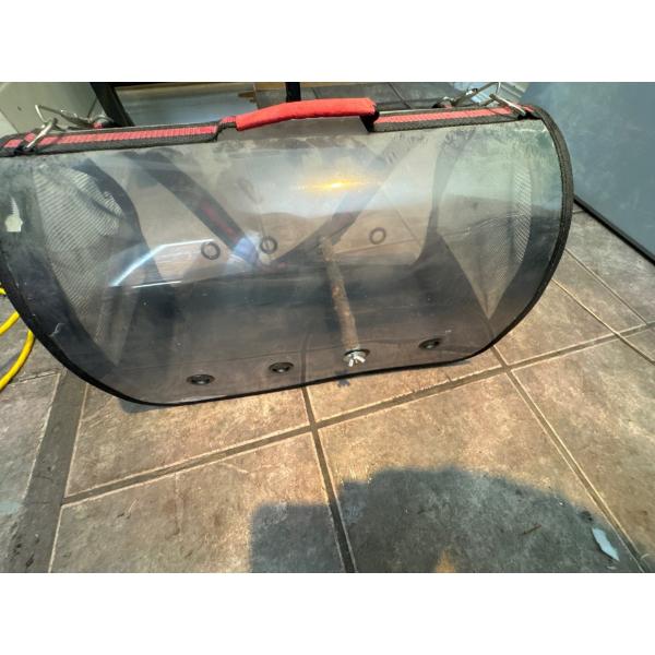  bird travel carrier or backpack.
Features a clear bubble or transparent shell for visibility.
Inclu