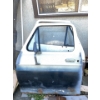 Image 1 : 2 doors off 1970s Ford with the fibreglass front visor and door panels