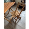 Image 1 : One rectangular folding table and two matching folding chairs. Made of wood with horizontal slat des