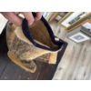 Image 2 :  Inuit kamiks (also known as mukluks), traditional soft boots made from seal skin designed for extre