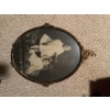 Image 3 : Oval portrait photograph featuring two children, set in an ornate brass frame with decorative accent