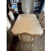 Image 1 : light-wood dining table and chairs set, which is expandable if needed. 