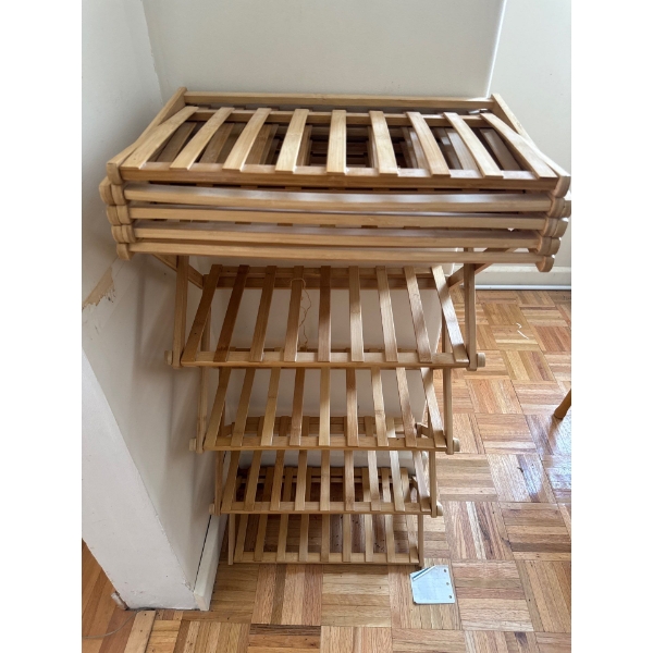  Foldable bamboo shoe rack, a versatile storage solution often used in entryways, closets, or bedroo