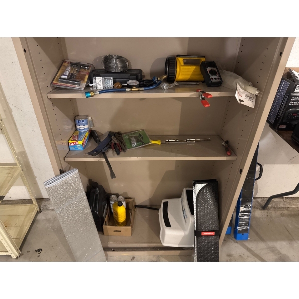 Steel cabinet and contents included, tire patch kit, big roll of wire, propane gauge, screws, brand 