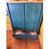 Image 1 : This item is a green Ethan Allen TV armoire featuring two doors for storage above two drawers, it is