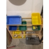 Image 1 : Tool or toy shelving unit with colorful containers for storage 34in wide 31in tall and 12in deep wit