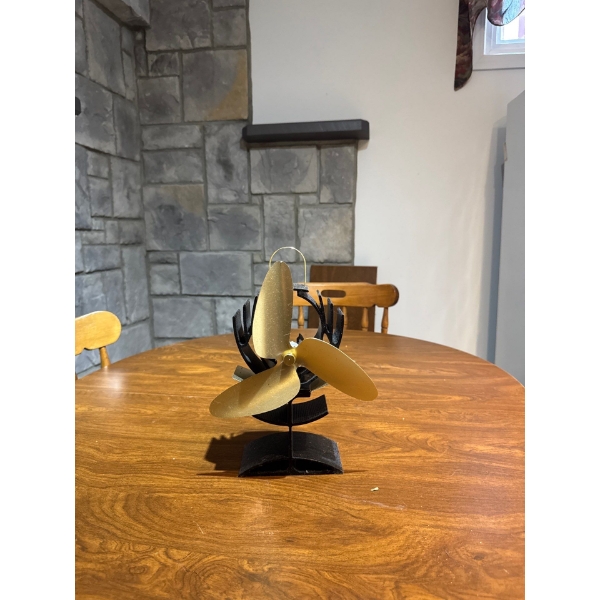 heat-powered wood stove fan, specifically identified as an Ecofan AirPlus. 