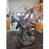 Image 4 : bronze sculpture titled "Starshooter," created by artist Lincoln Fox and often produced by the Fran
