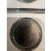 Image 23 : Canadian coins, featuring commemorative dollar coins and 50 cent pieces. Notable coins include a 197